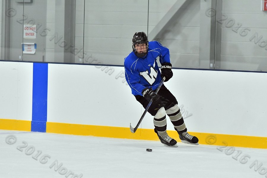 Wheaton College Men\'s Ice Hockey vs Middlesex Community College. - Photo By: KEITH NORDSTROM